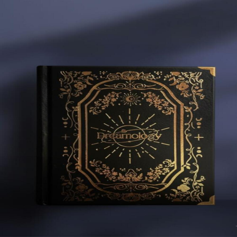 Dreamology dream journal shown open on a bedside table