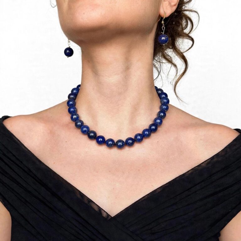 Natural lapis lazuli necklace with polished beads and an elegant gold clasp