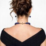 Natural lapis lazuli necklace with polished beads and an elegant gold clasp