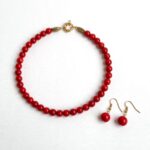 Treated red agate necklace with polished 10 mm beads and a clasp