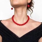 Treated red agate necklace with polished 10 mm beads and a clasp