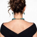 Compressed Sinai turquoise necklace with polished beads and an ornate gold clasp
